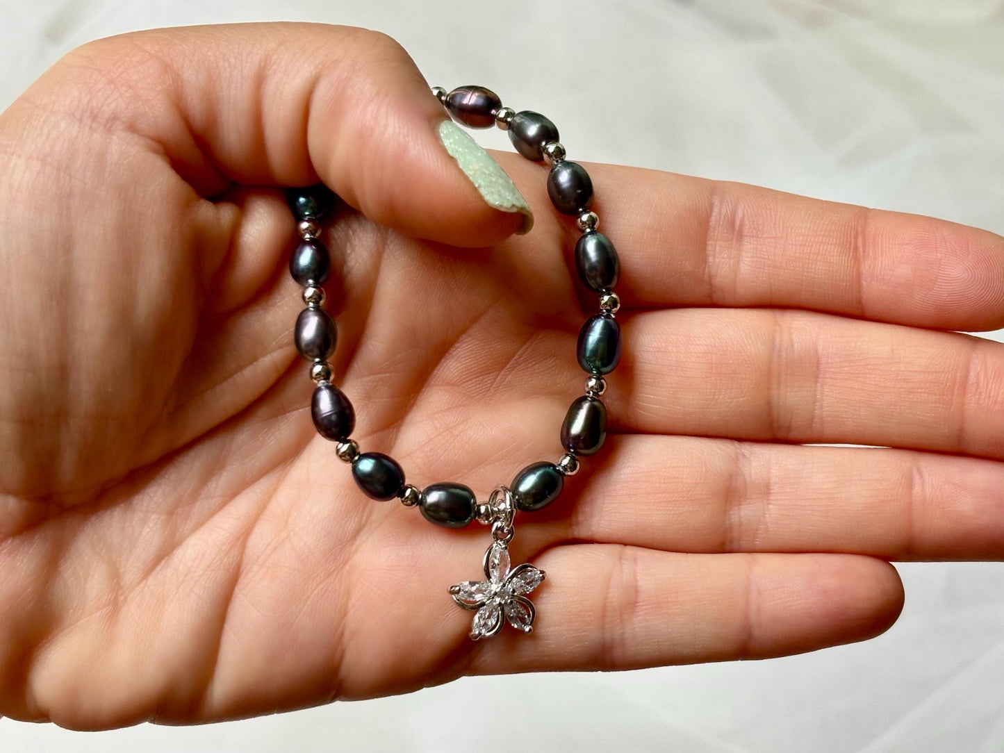 Black Pearl Bracelet with Silver Flower Charm