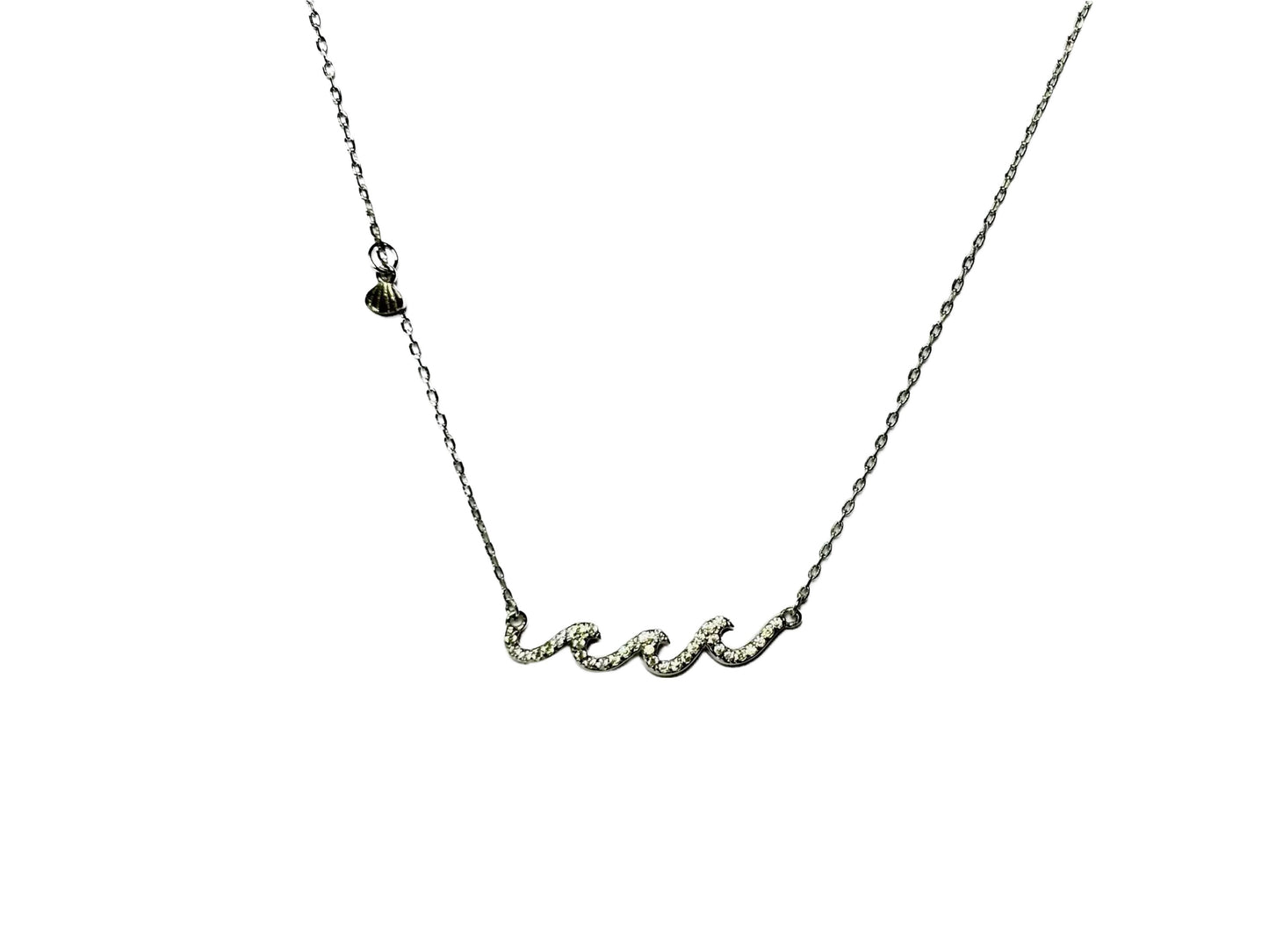 A silver necklace with a cursive pendant.