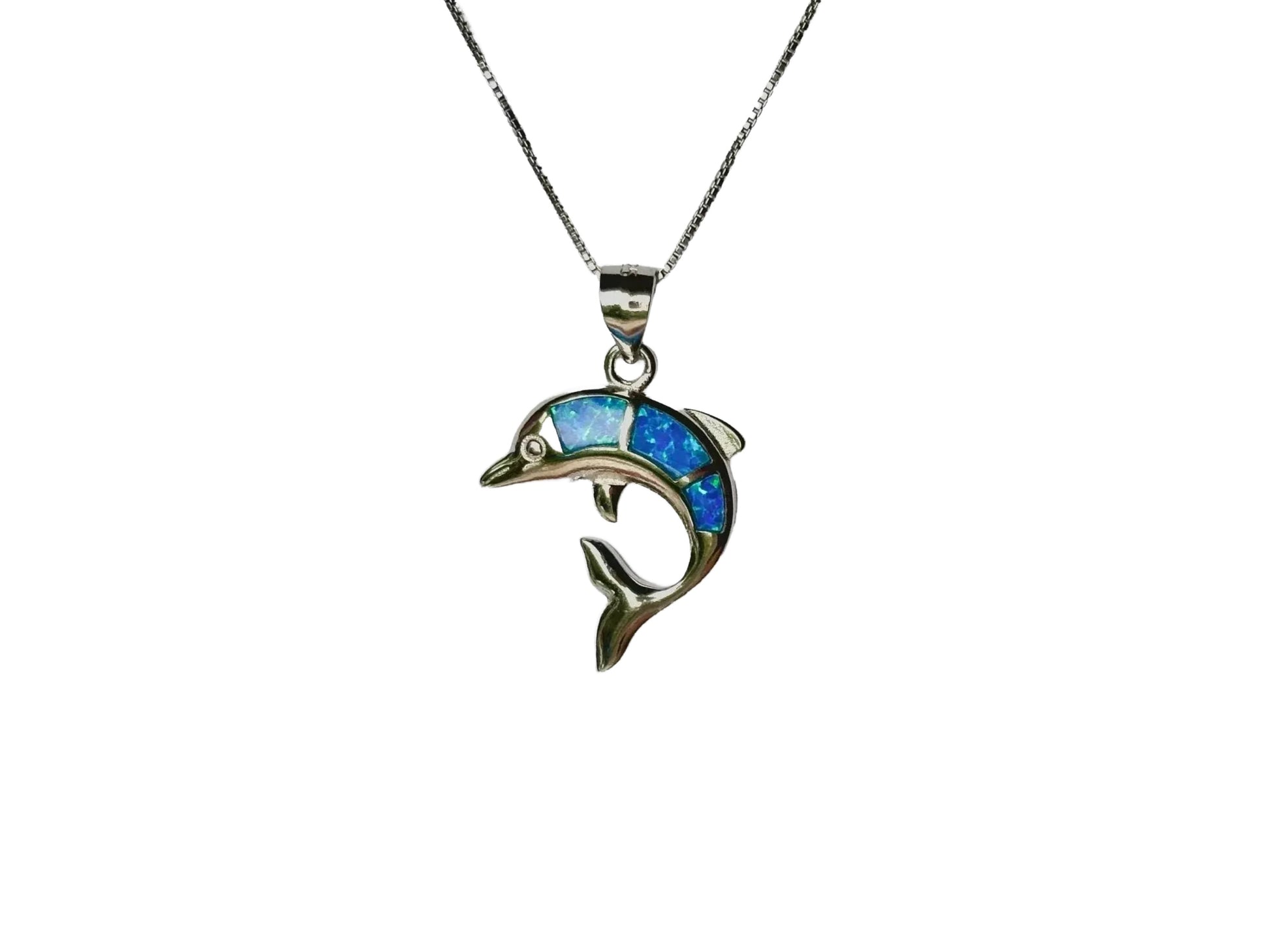 A silver pendant necklace with a dolphin pendant made of opal stones.