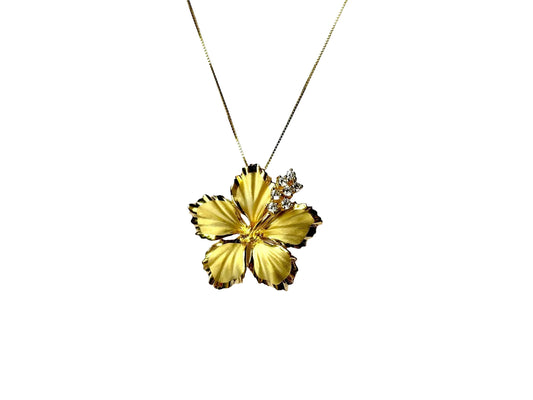 A gold-colored pendant necklace with a yellow flower-shaped pendant and a small gemstone accent.