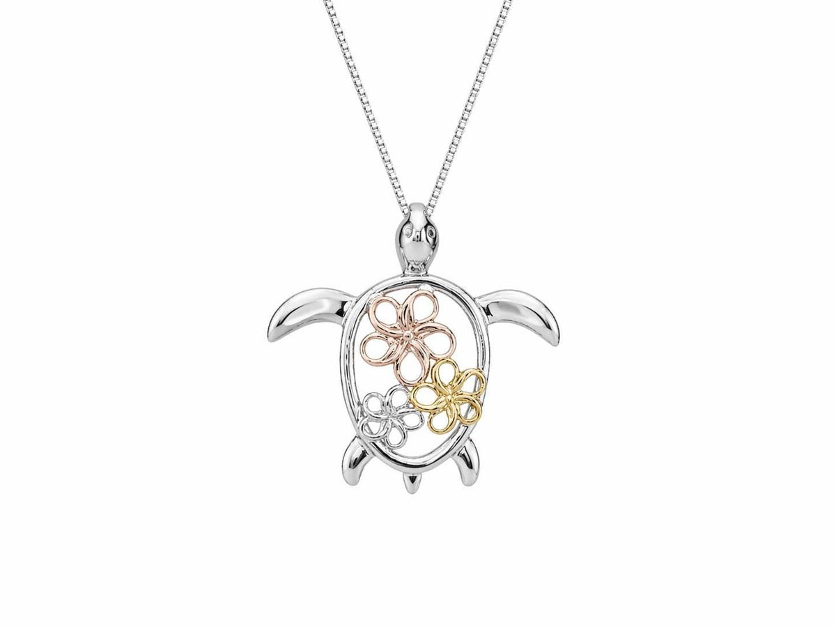 May include: A silver-toned pendant necklace featuring a turtle design. The turtle's shell has an oval cutout with three flower designs in rose gold, gold, and silver. The necklace has a delicate chain.
