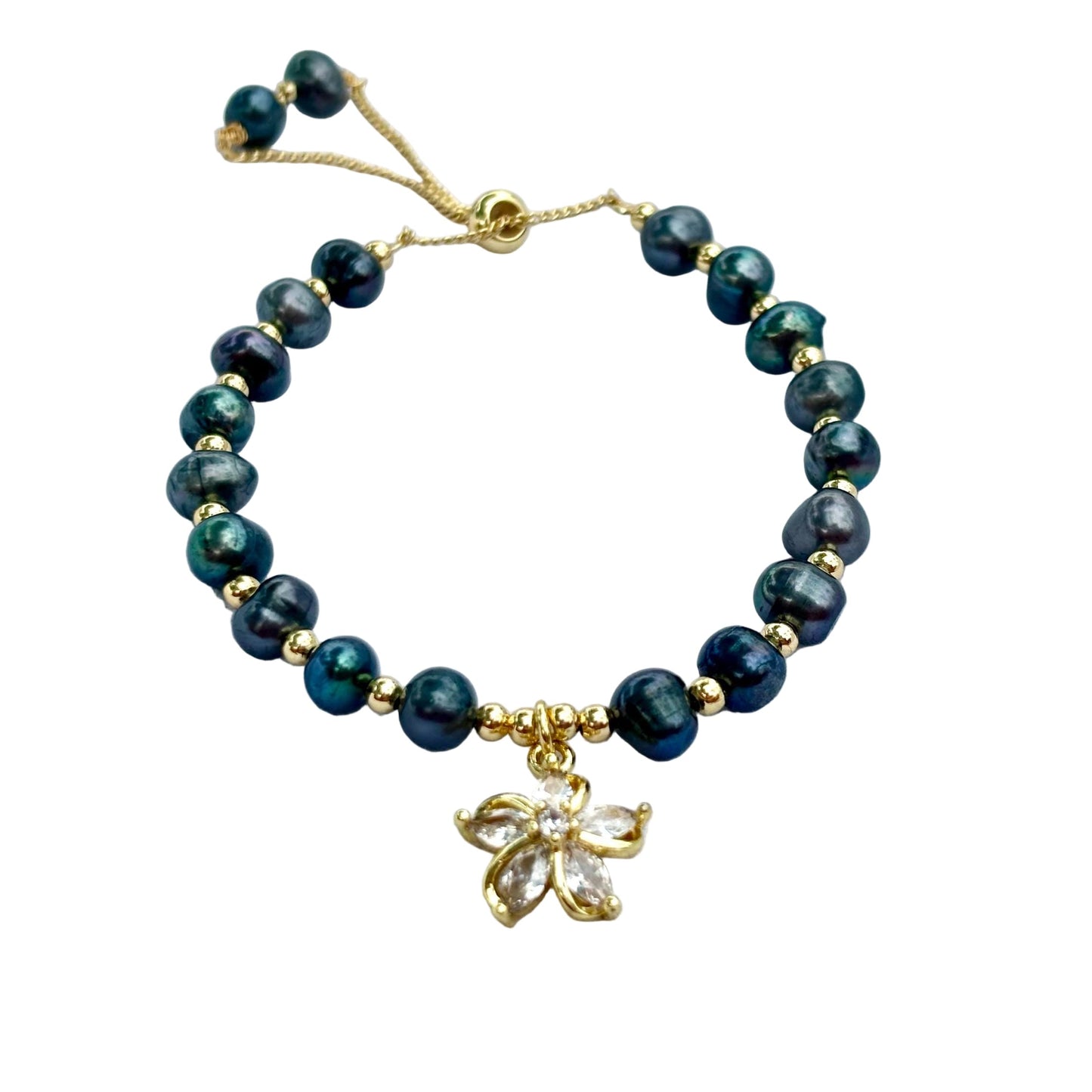 The Island Bloom – Black Pearl Bracelet with Gold Flower Charm